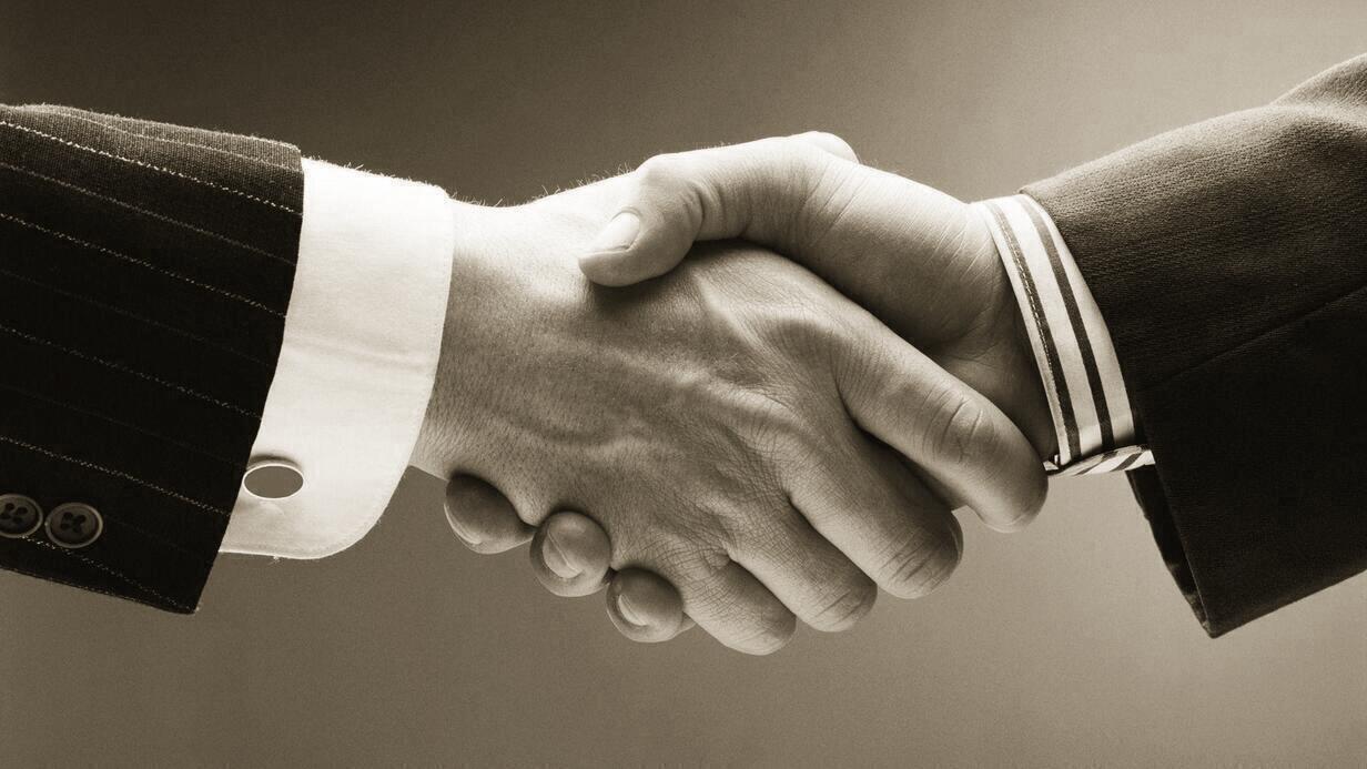 The Lost Art of the Firm Handshake: A Gentleman’s First Impression